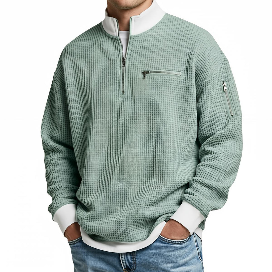 Suéter texturizado para hombre con media cremallera y bolsillos