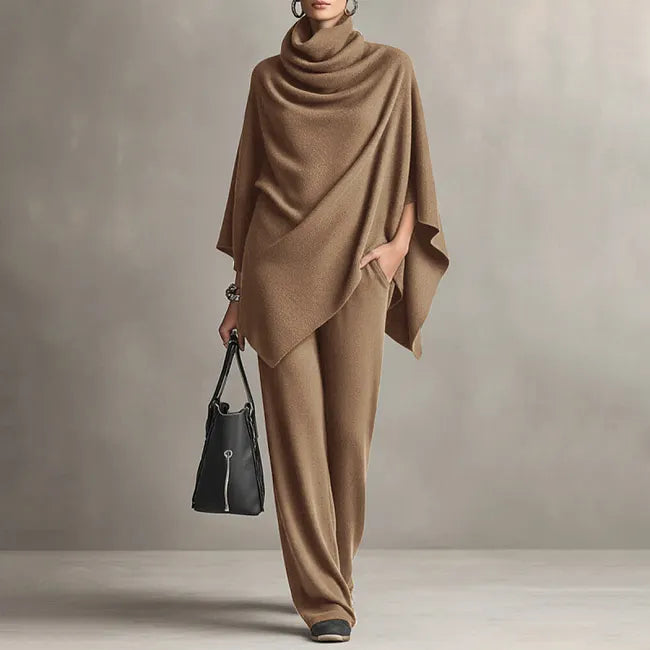 Conjunto elegante de capa drapeada y pantalón ancho para mujer