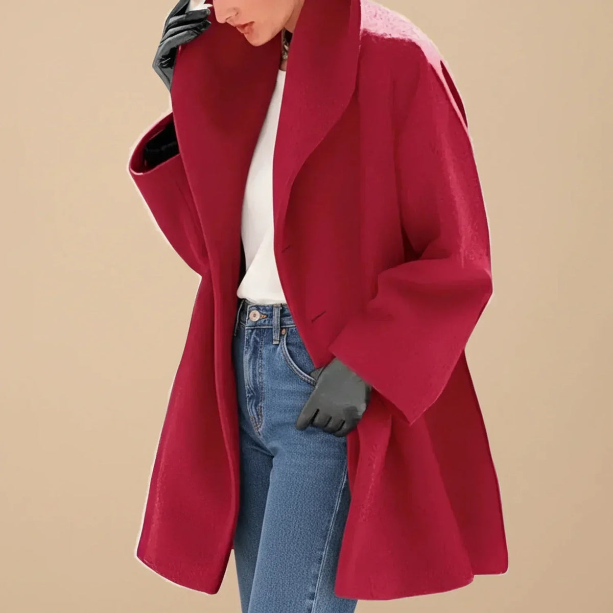 Abrigo de mujer oversize con cuello ancho y corte evasé elegante