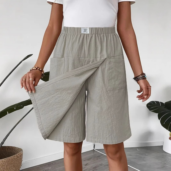 Pantalón corto largo mujer con falda superpuesta y bolsillos
